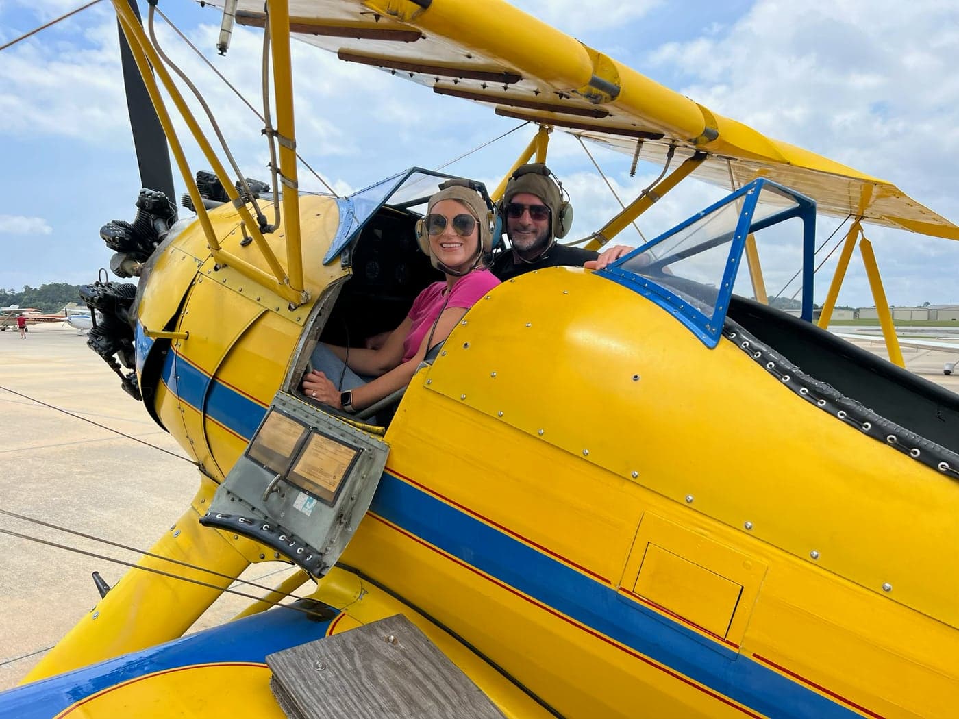 Stephanie and Andy in the bi-plane before their flight over Jekyll Island